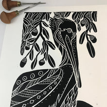 Load image into Gallery viewer, Brown Pelican and Live Oaks, limited edition black and white block print. Hand pulled on 12x18 paper