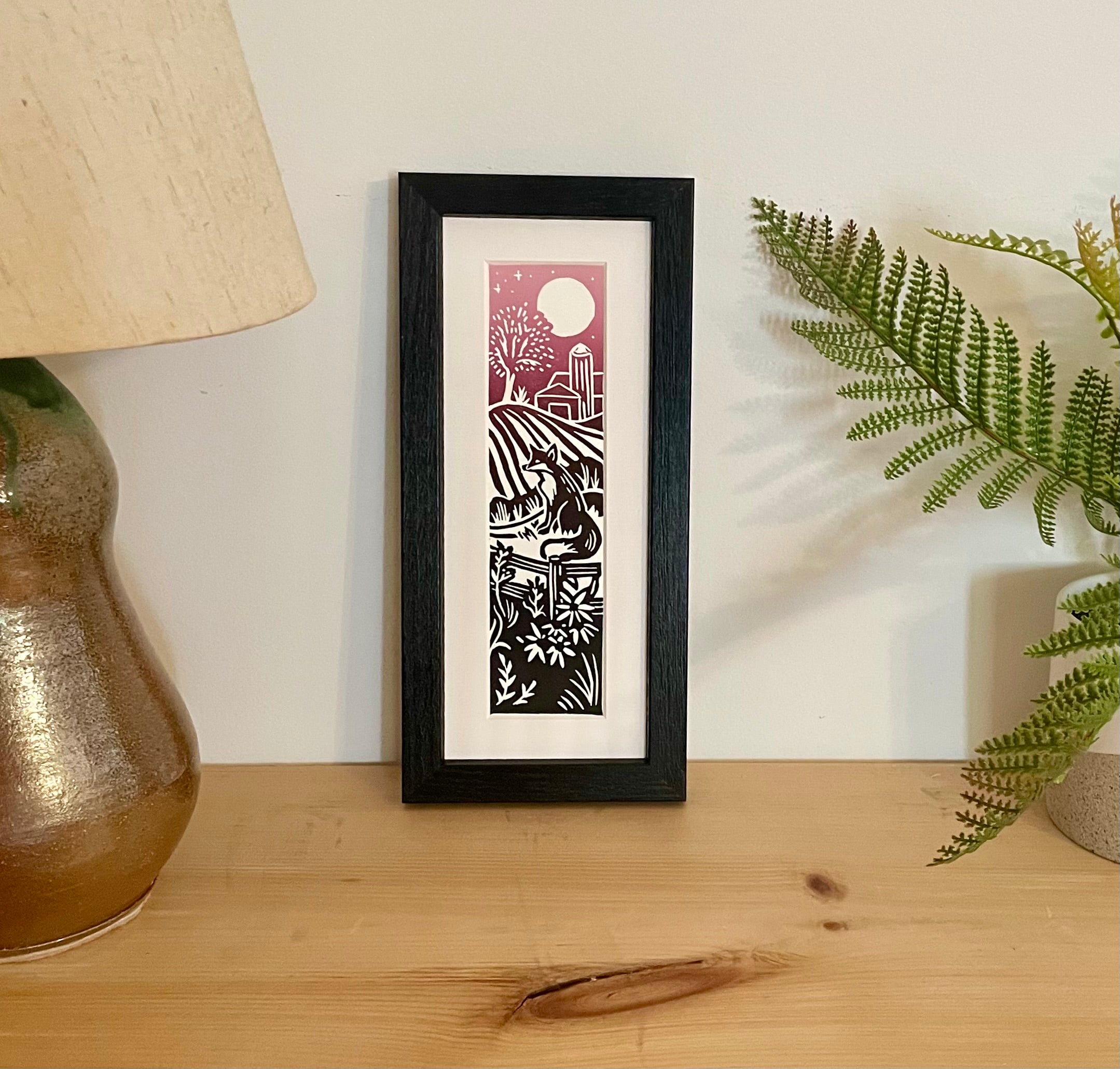 “Dairyland Meadow by Moonlight” Framed Bookmark Print 2x8 inches, Red Fox