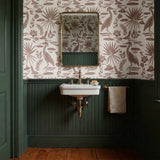 Tropical pattern with brown birds, palm fronds, and foliage on cream background