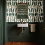 Geometric botanical pattern with teal green leaves, circles, and gray squares on cream background