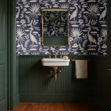Navy blue background with white tropical birds, palm fronds, and botanical motifs in repeating patte