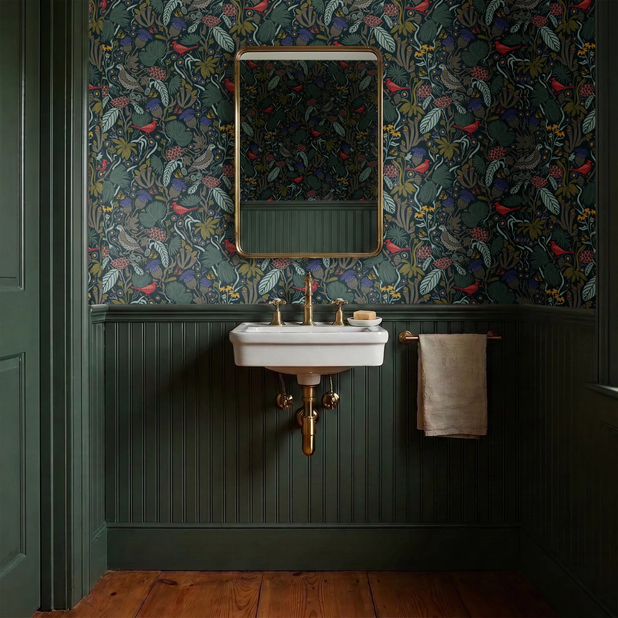 Dense floral pattern with red birds, tropical leaves, flowers and berries on dark teal background