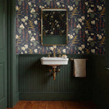 Vintage floral pattern with white flowers, golden stalks, and red blooms on dark gray background