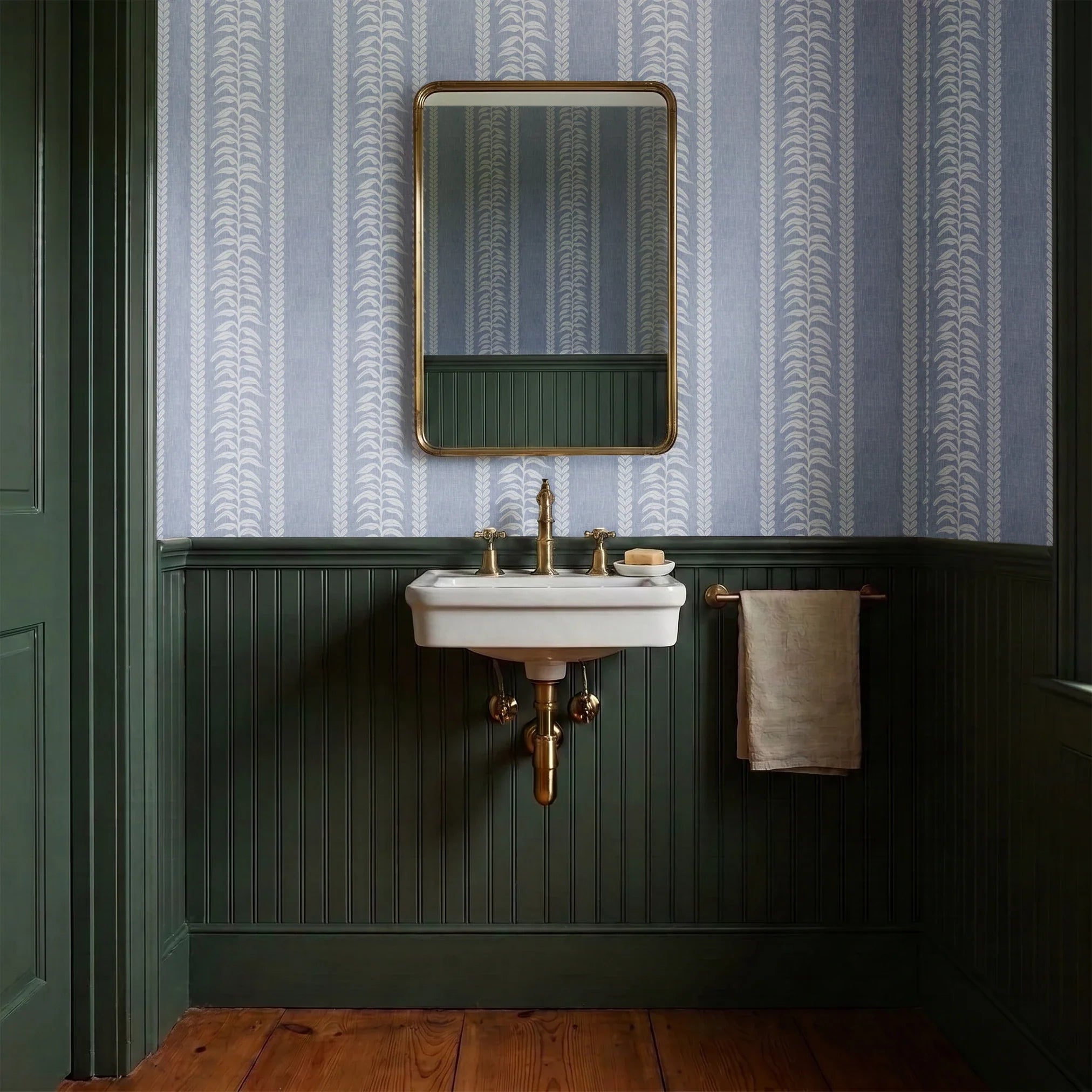 Blue and white vertical stripe pattern with leaf motifs and textured linen background