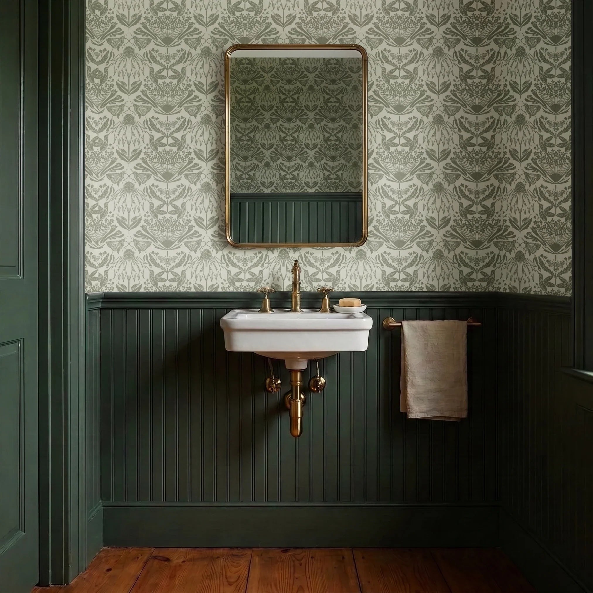 Symmetrical art nouveau botanical pattern with protea flowers, moths, and foliage in sage green on c
