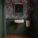 Decorative pattern with gray herons, red flowers, and beige foliage on dark background