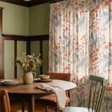 Decorative pattern with blue herons, beige cranes, and red flowers on cream background