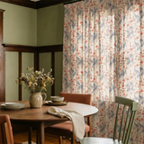Herons and cranes among red flowers and beige foliage in Asian-inspired decorative pattern