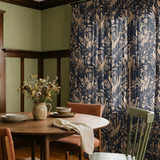 Elegant herons and cranes with flowers in beige on dark navy blue background, nature pattern