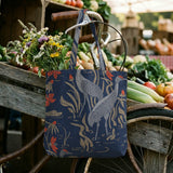 Herons amid flowering plants on navy blue background, decorative pattern with coral blooms and folia