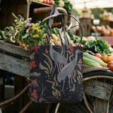 Herons and cranes among red flowers and reeds on dark blue background in decorative pattern