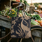 Herons and cranes among reeds and flowers in beige on dark navy blue background