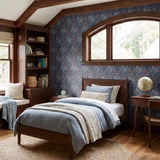 Blue wallpaper pattern with white herons, coral flowers, and green foliage in an Art Nouveau style