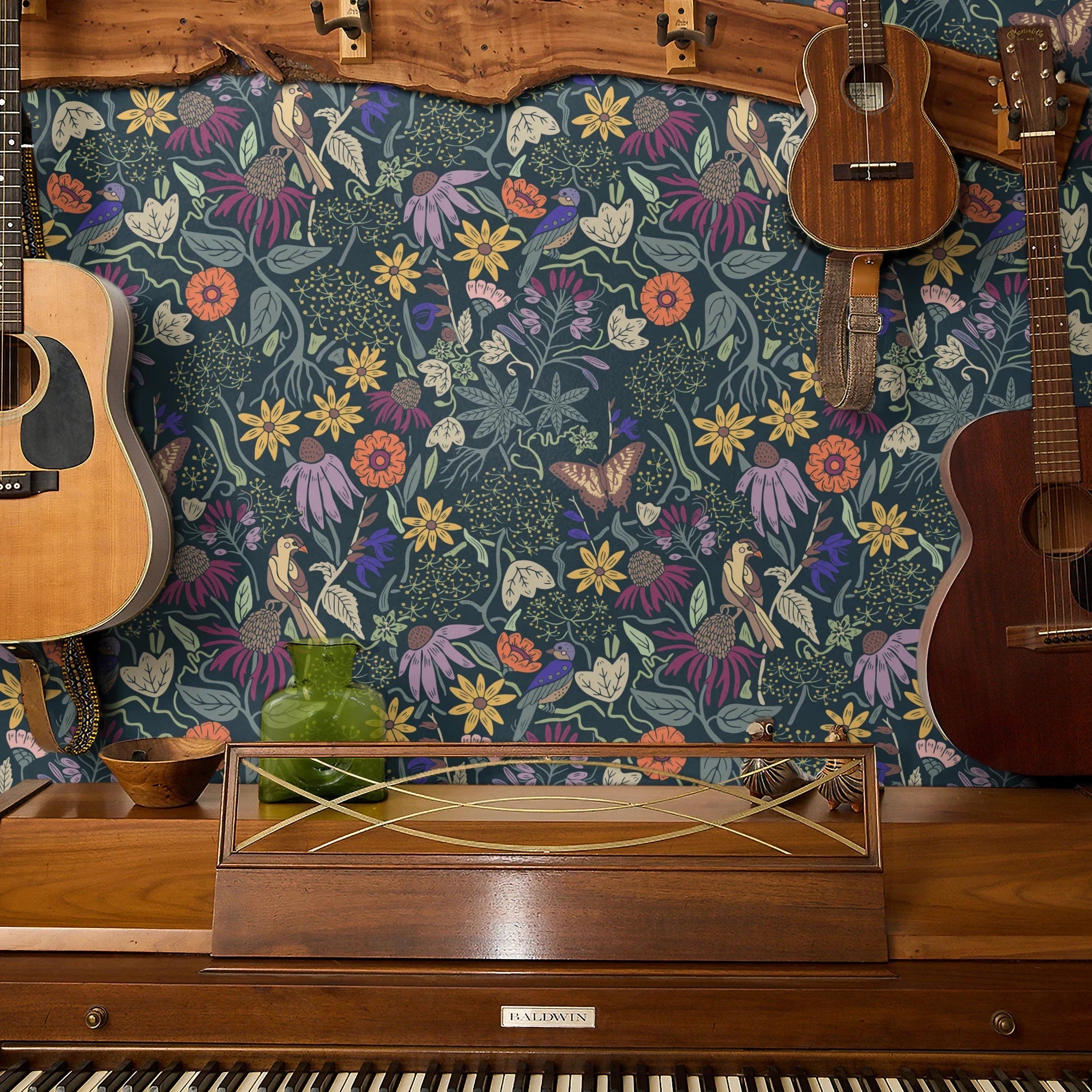 Vibrant floral pattern with colorful flowers, birds, and foliage on dark teal background