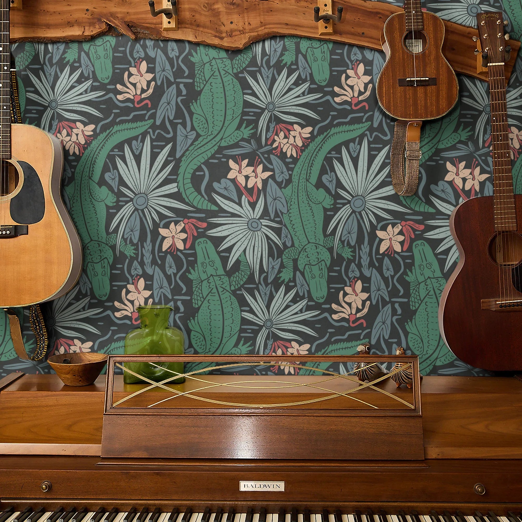 Tropical pattern with green alligators, palm fronds, and coral flowers on dark background