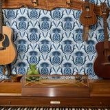 Decorative damask pattern with blue pineapple and palm motifs on white background
