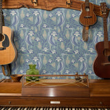 Art Nouveau floral pattern with white lilies, blue-green leaves and decorative pods on blue backgrou