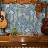 Art Nouveau floral pattern with white lilies, blue-green leaves and organic flowing design