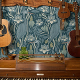 Blue-green botanical pattern with stylized flowers, leaves, and swans in Art Nouveau style