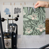 Art Nouveau pattern with herons, water lilies, and reeds in green, white, and lavender tones