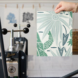 Tropical pattern with alligators, palm leaves, and orchid flowers in green, coral, and cream tones