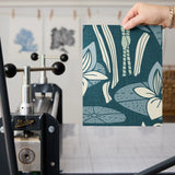 Blue-green botanical pattern with stylized flowers, leaves, and swans in Art Nouveau style