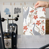 Decorative pattern with gray herons, brown rabbits, and red-orange flowers on white background