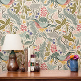 Decorative pattern with colorful birds, flowers, and foliage in vintage folk art style