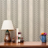 Vertical stripes pattern in beige and white with decorative scrollwork motifs alternating with plain
