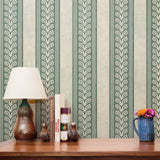 Vertical striped pattern with ornate scrollwork borders in sage green and cream tones
