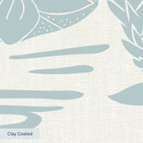 Tropical pattern with herons, palm fronds, and foliage in sage green on cream background
