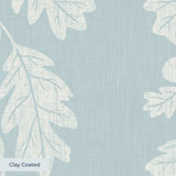 Oak leaves and acorns pattern in white on pale blue-gray background