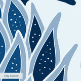 Blue and white tropical pineapple damask pattern with stylized leaves and geometric motifs