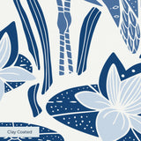 Blue and white decorative pattern with stylized birds, flowers, and botanical motifs in a folk art s