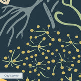 Vibrant floral pattern with colorful flowers, birds, and foliage on dark teal background