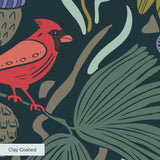 Dense floral pattern with red birds, tropical leaves, flowers and berries on dark teal background