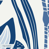 Blue and white decorative pattern with birds, flowers, and foliage in folk art style