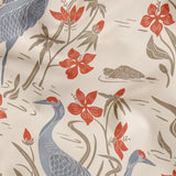 Herons and cranes among red flowers and beige foliage in Asian-inspired decorative pattern