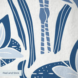 Blue and white decorative pattern with stylized birds, flowers, and botanical motifs in a folk art s