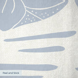 Tropical pattern with palm fronds, herons, and foliage in soft blue-gray on cream background