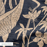 Cranes and flora pattern in beige on dark blue background with Asian-inspired design