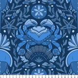 Symmetrical blue folk art design with hands forming heart shape, surrounded by botanical motifs