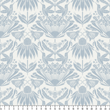 Symmetrical botanical pattern with stylized flowers, leaves, and moths in soft blue-gray on cream ba