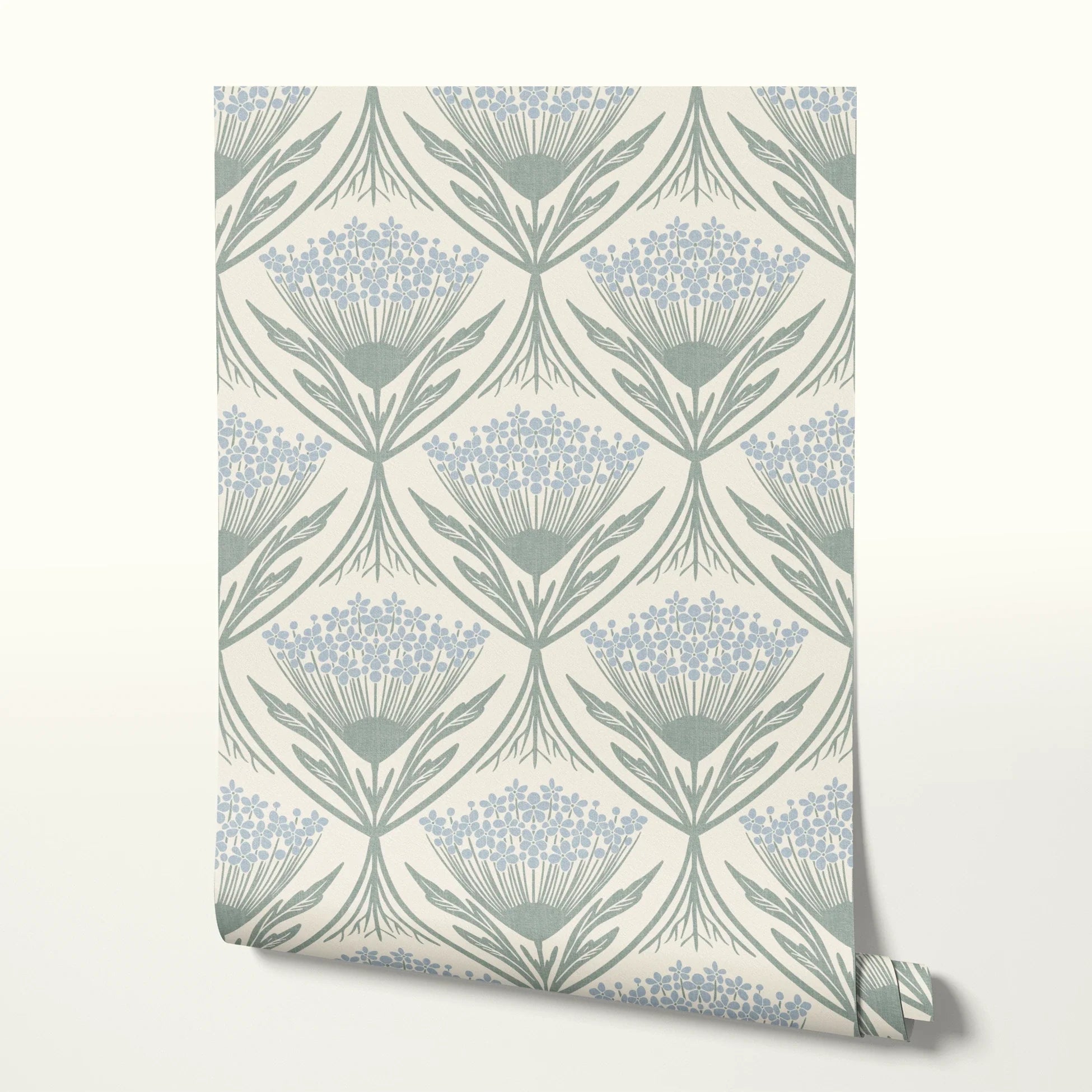 Art Nouveau floral pattern with stylized blue flowers and sage green leaves on cream background