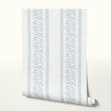 Blue and white botanical stripe pattern with stylized leaf motifs and vertical borders