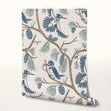 Birds and pine cones on branches in blue, green, and beige decorative pattern