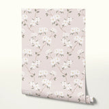Delicate floral pattern with white flowers and gray leaves on pale pink background