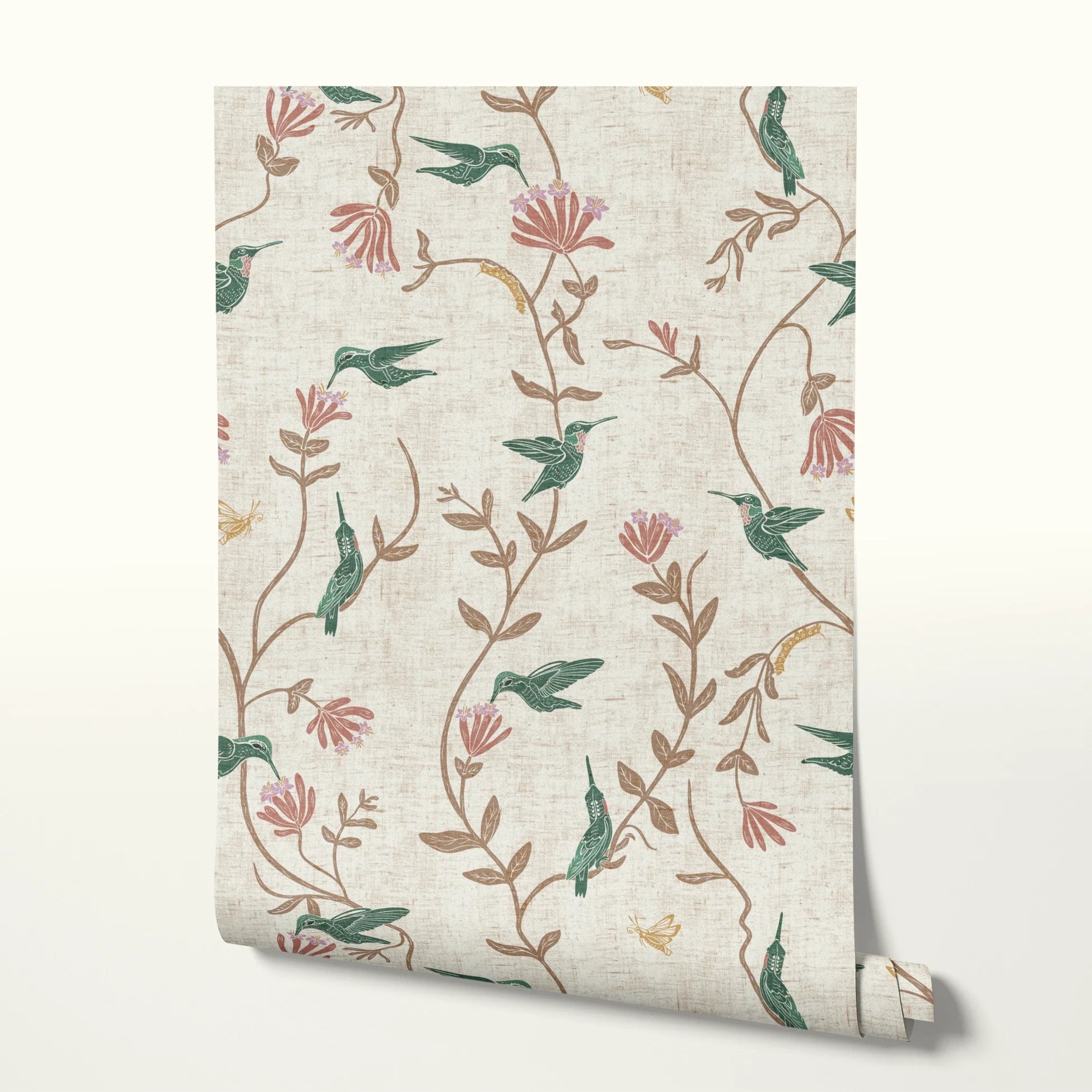 Floral pattern with hummingbirds, pink flowers, and tan foliage on cream textured background
