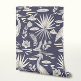 Navy blue background with white tropical birds, palm fronds, and botanical motifs in repeating patte