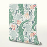 Tropical pattern with alligators, palm leaves, and orchid flowers in green, coral, and cream tones